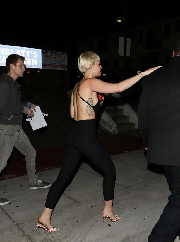 pictures side boob miley cyrus
